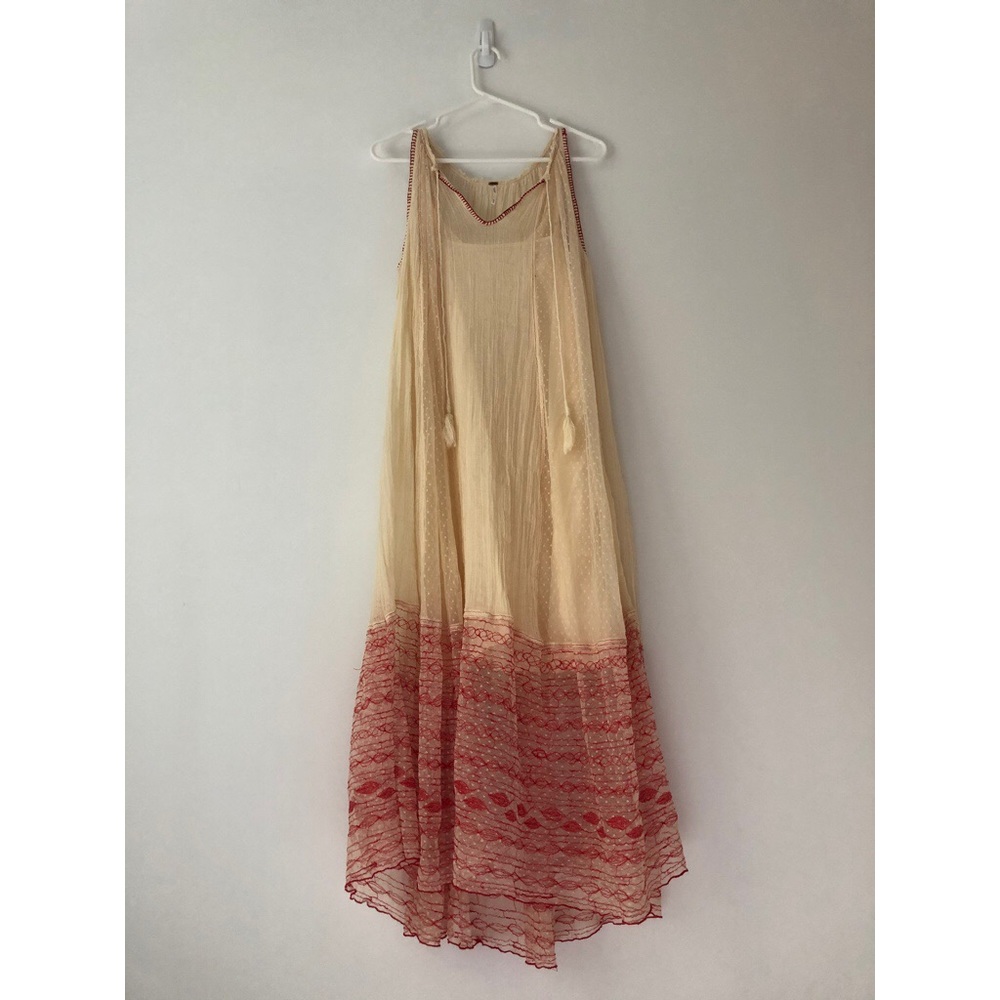 Free People• Beautifully detailed maxi dress